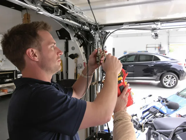 Temple City Garage Door Repair safety certified technician performing cable replacement in Temple City