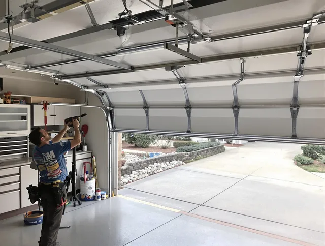 Garage door track repair service by Temple City Garage Door Repair in Temple City
